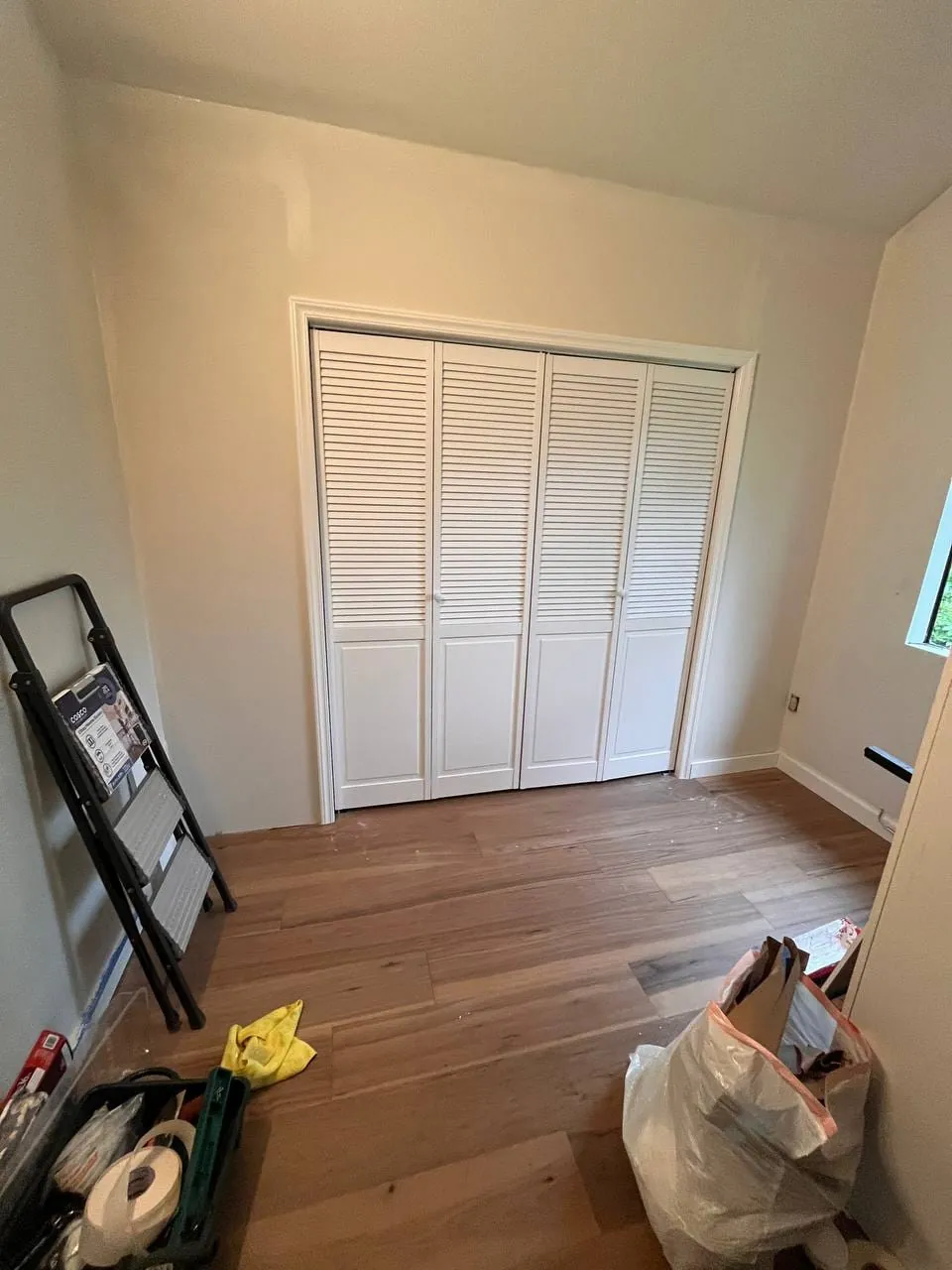 The finished closet with its louvered doors closed