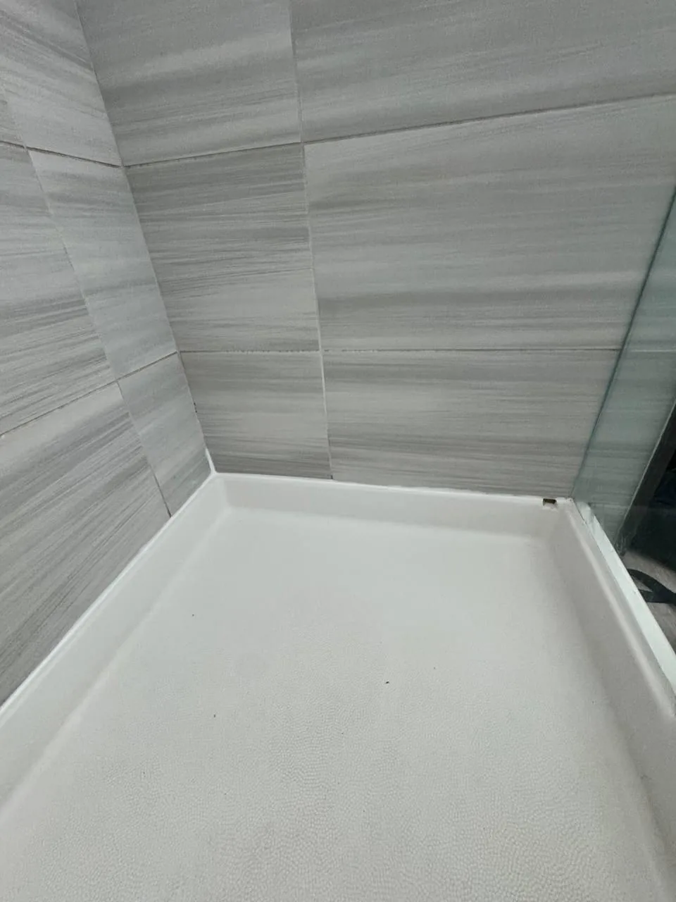 The same joint after the old sealant was removed and a new bead applied